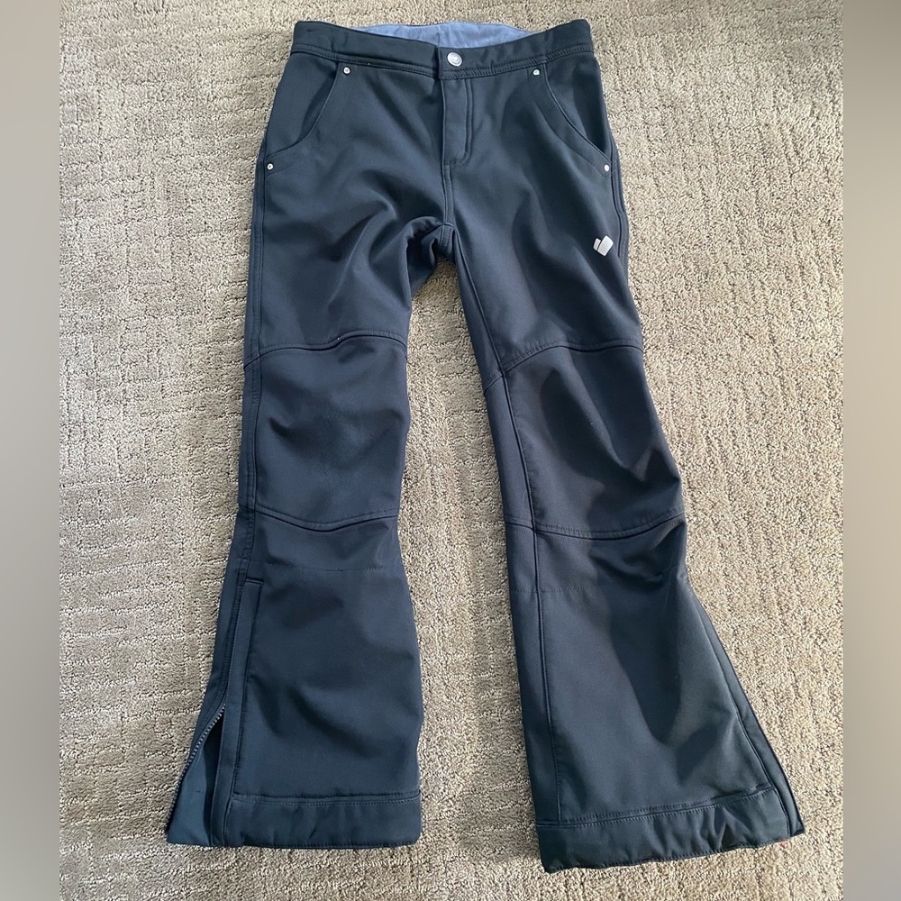 Black Obermeyer soft shell ski pants. Size Teen M (10-12).Excellent condition.